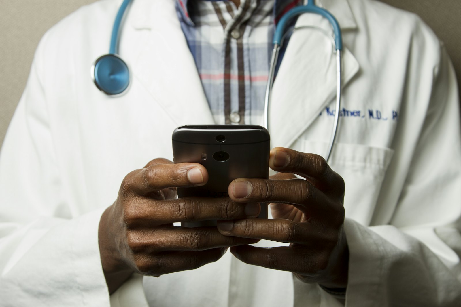 Clinician using mobile health technology